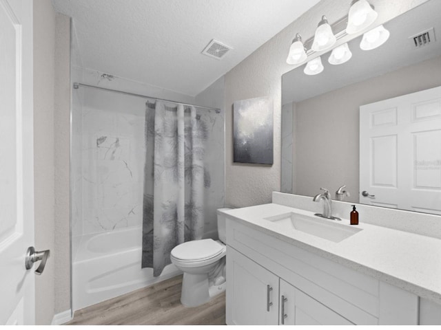 3 Pine Court Ln, Ocala, FL 34472 - full bathroom with toilet, visible vents, wood finished floors, and vanity