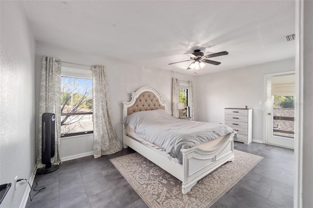3870 NE 17th Street Cir, Ocala, FL 34470 - bedroom featuring baseboards, visible vents, ceiling fan, and access to outside