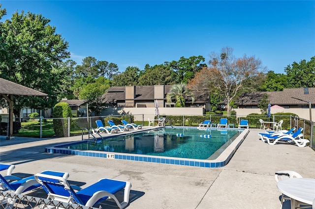 3870 NE 17th Street Cir, Ocala, FL 34470 - community pool featuring fence and a patio area