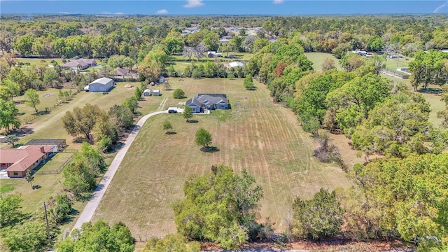 drone / aerial view with a forest view