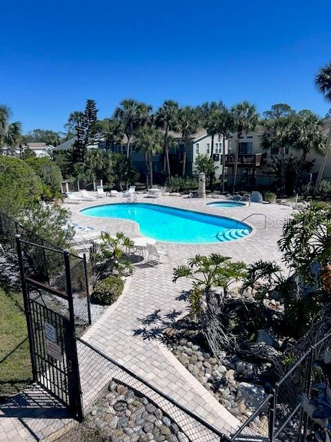 community pool with a patio