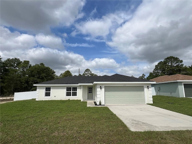ranch-style home featuring stucco siding, driveway, a front lawn, and a garage