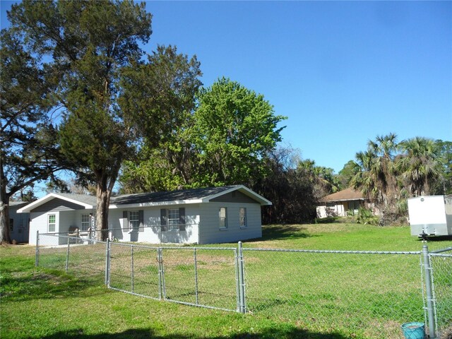 view of yard with fence
