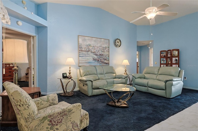 carpeted living area with lofted ceiling, baseboards, and ceiling fan