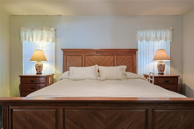 bedroom featuring multiple windows