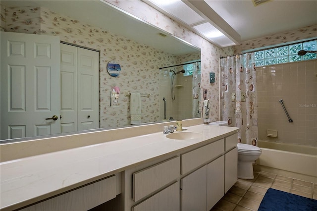 full bathroom with tile patterned floors, toilet, vanity, and wallpapered walls