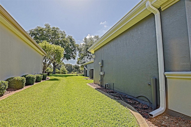 13968 SE 96th Cir, Summerfield, FL 34491 - view of green lawn featuring central air condition unit