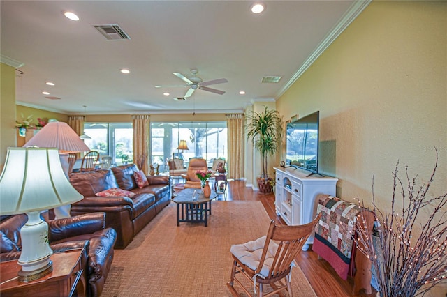 13968 SE 96th Cir, Summerfield, FL 34491 - living area with ornamental molding, recessed lighting, a ceiling fan, and wood finished floors