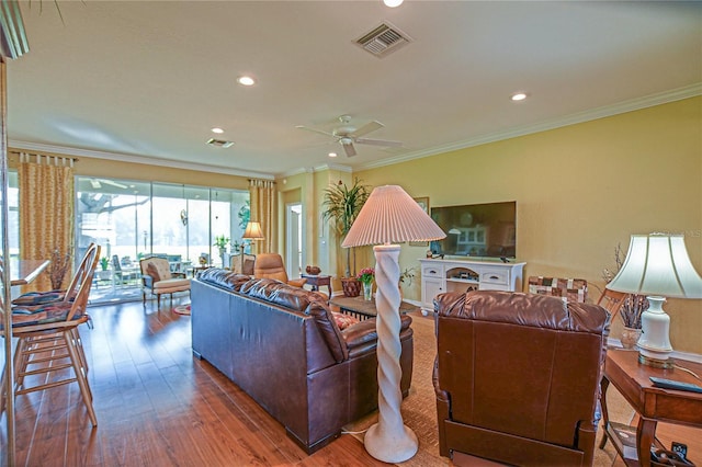 13968 SE 96th Cir, Summerfield, FL 34491 - living area featuring a ceiling fan, wood finished floors, recessed lighting, and crown molding