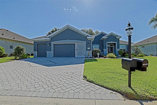 13968 SE 96th Cir, Summerfield, FL 34491 - ranch-style home featuring a front yard, a garage, decorative driveway, and stucco siding