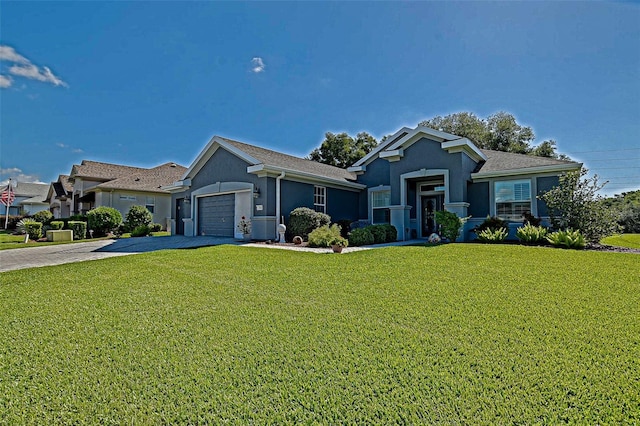 13968 SE 96th Cir, Summerfield, FL 34491 - ranch-style home with driveway, stucco siding, a front lawn, and an attached garage