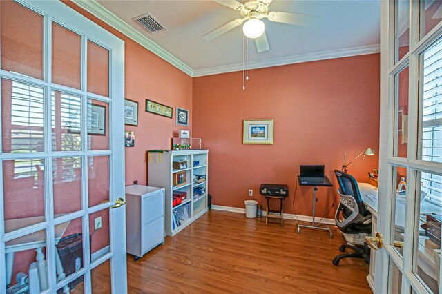 13968 SE 96th Cir, Summerfield, FL 34491 - office space featuring wood finished floors, crown molding, baseboards, a ceiling fan, and french doors