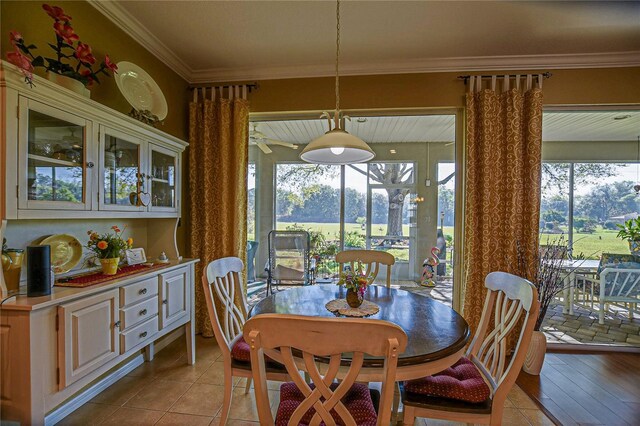 13968 SE 96th Cir, Summerfield, FL 34491 - dining space featuring crown molding