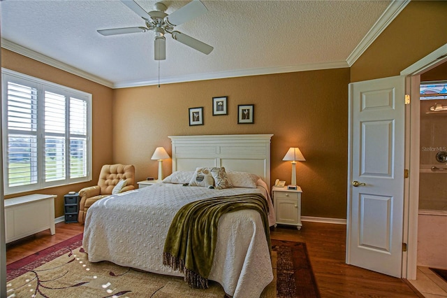 13968 SE 96th Cir, Summerfield, FL 34491 - bedroom featuring crown molding, dark wood-style flooring, a textured ceiling, baseboards, and ceiling fan