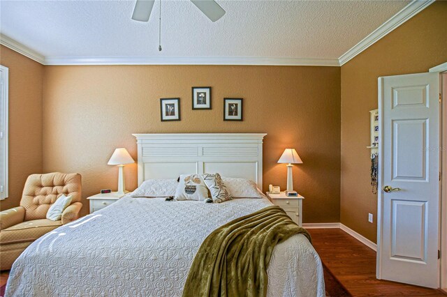 13968 SE 96th Cir, Summerfield, FL 34491 - bedroom with dark wood-style floors, crown molding, baseboards, ceiling fan, and a textured ceiling