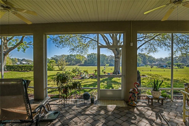 13968 SE 96th Cir, Summerfield, FL 34491 - sunroom / solarium with ceiling fan and plenty of natural light