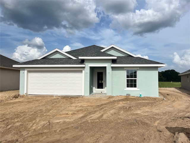4504 SW 90th Lane Rd, Ocala, FL 34476 - view of front of house with roof with shingles and stucco siding