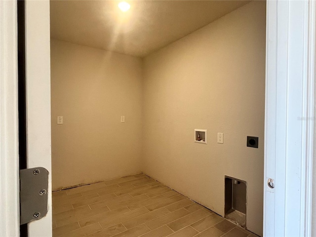 4504 SW 90th Lane Rd, Ocala, FL 34476 - laundry area with hookup for an electric dryer, light wood-type flooring, and washer hookup