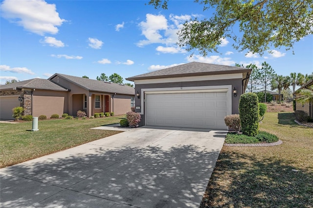 ranch-style house featuring driveway, stucco siding, a front yard, and a garage