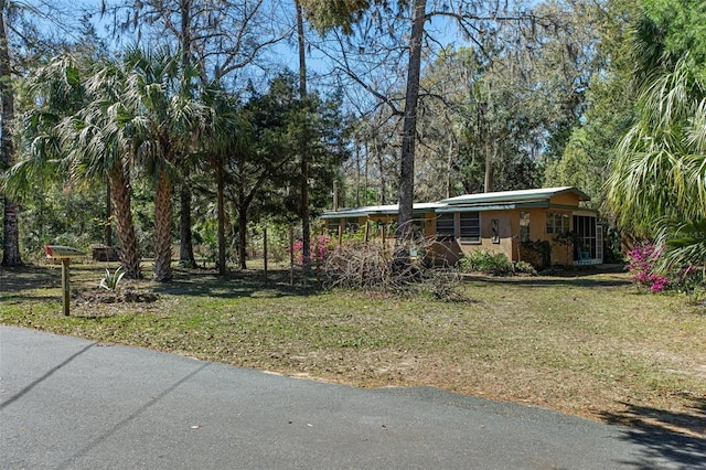 5368 S Parkland Ter, Homosassa, FL 34448 - exterior space with a front yard and stucco siding