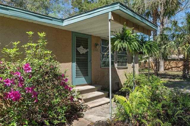 5368 S Parkland Ter, Homosassa, FL 34448 - view of exterior entry featuring stucco siding