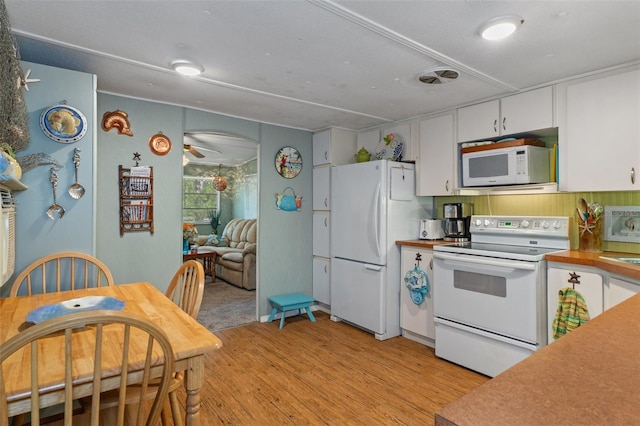 5368 S Parkland Ter, Homosassa, FL 34448 - kitchen with a ceiling fan, light wood finished floors, white appliances, and white cabinets