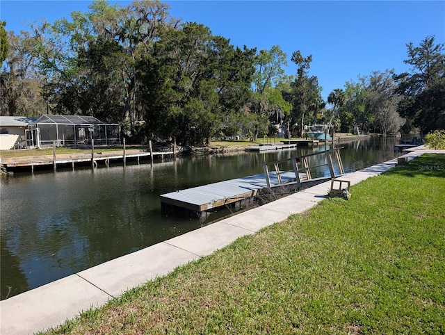 3713 N Suwanee Pt, Crystal River, FL 34428 - dock area with a lawn and a water view