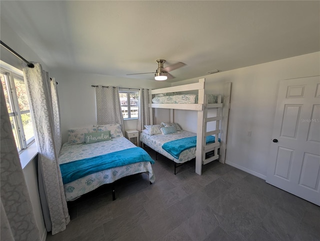 3713 N Suwanee Pt, Crystal River, FL 34428 - bedroom with visible vents, baseboards, and a ceiling fan