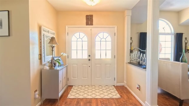 5291 NW 20th Pl, Ocala, FL 34482 - foyer with wood finished floors and baseboards
