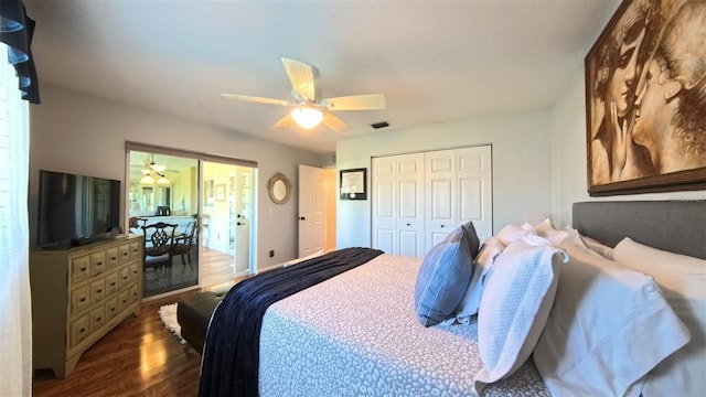 5291 NW 20th Pl, Ocala, FL 34482 - bedroom with dark wood finished floors, visible vents, a closet, and ceiling fan