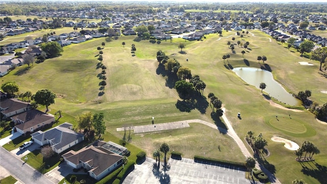5291 NW 20th Pl, Ocala, FL 34482 - drone / aerial view with view of golf course, a residential view, and a water view