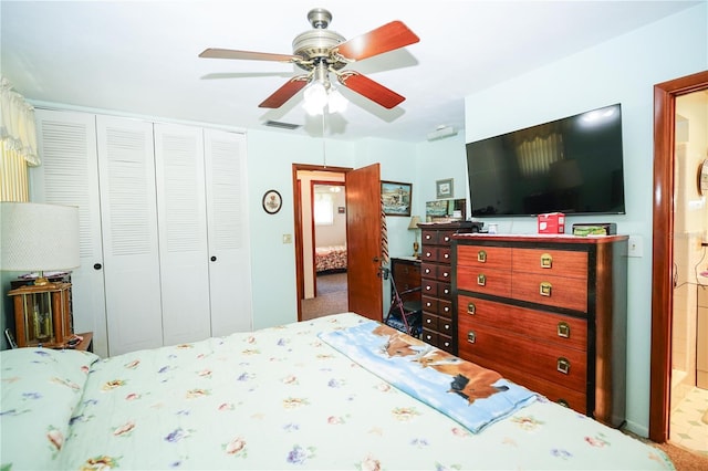 390 SW Shorewood Dr, Dunnellon, FL 34431 - carpeted bedroom featuring a closet, visible vents, ceiling fan, and connected bathroom