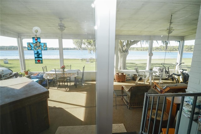 390 SW Shorewood Dr, Dunnellon, FL 34431 - view of patio / terrace with ceiling fan and a water view