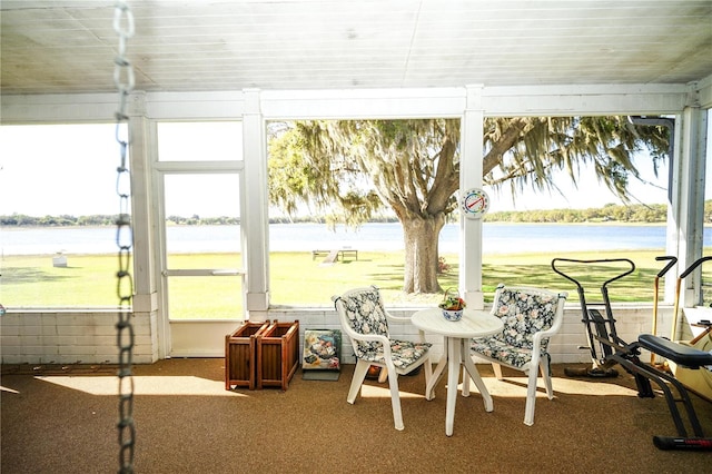 390 SW Shorewood Dr, Dunnellon, FL 34431 - sunroom / solarium featuring a water view and plenty of natural light