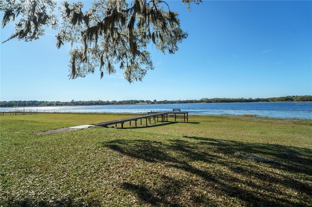 390 SW Shorewood Dr, Dunnellon, FL 34431 - view of dock with a water view and a yard