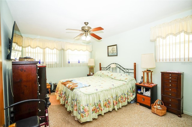 390 SW Shorewood Dr, Dunnellon, FL 34431 - bedroom with a ceiling fan and carpet flooring