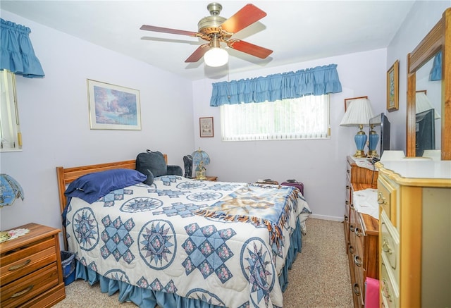 390 SW Shorewood Dr, Dunnellon, FL 34431 - bedroom with a ceiling fan and light colored carpet