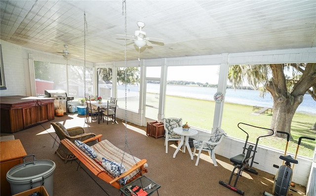 390 SW Shorewood Dr, Dunnellon, FL 34431 - sunroom / solarium featuring ceiling fan, a water view, and a hot tub