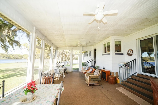 390 SW Shorewood Dr, Dunnellon, FL 34431 - sunroom / solarium with ceiling fan, entry steps, and a healthy amount of sunlight