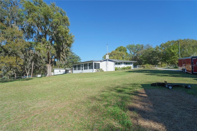 390 SW Shorewood Dr, Dunnellon, FL 34431 - view of yard featuring a sunroom