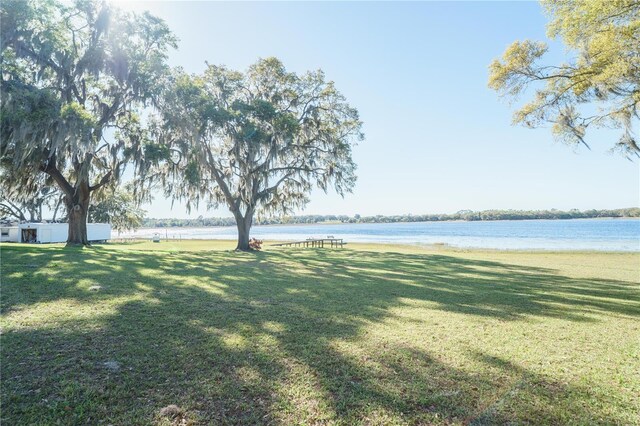 390 SW Shorewood Dr, Dunnellon, FL 34431 - view of yard featuring a water view