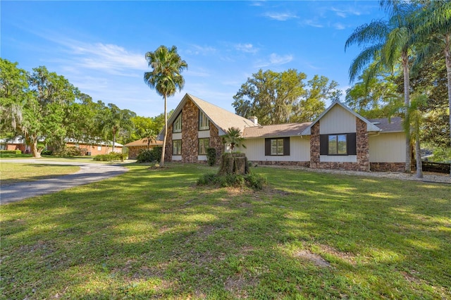 2130 SW 37th Street Rd, Ocala, FL 34471 - view of front of home with a front lawn and driveway
