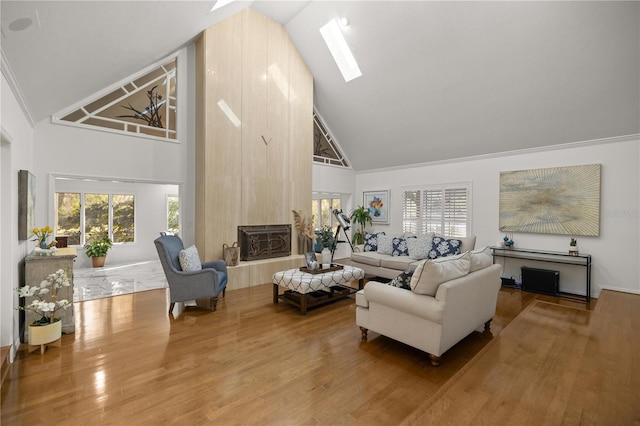 2130 SW 37th Street Rd, Ocala, FL 34471 - living room featuring a skylight, wood finished floors, and a wealth of natural light