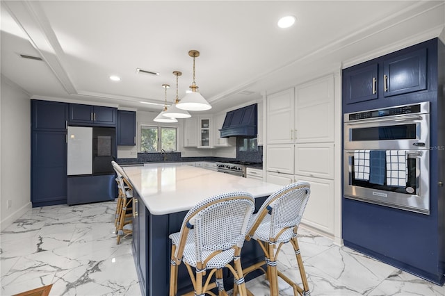2130 SW 37th Street Rd, Ocala, FL 34471 - kitchen with visible vents, marble finish floor, appliances with stainless steel finishes, and premium range hood