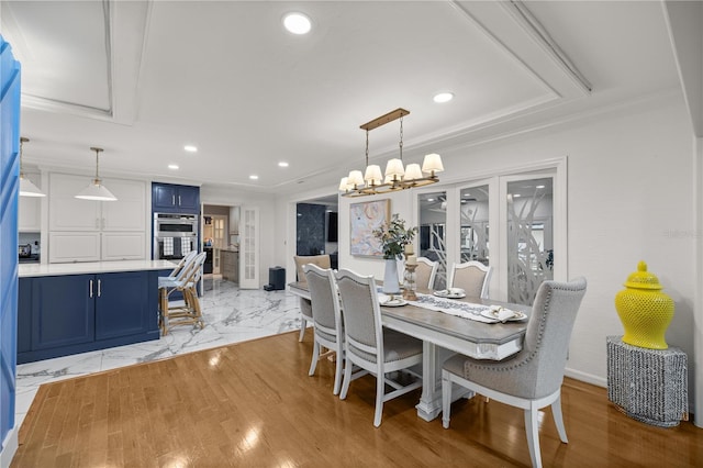 2130 SW 37th Street Rd, Ocala, FL 34471 - dining space with recessed lighting, a notable chandelier, marble finish floor, and ornamental molding