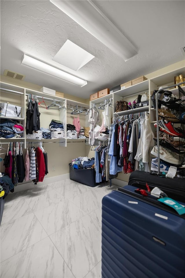 2130 SW 37th Street Rd, Ocala, FL 34471 - walk in closet featuring visible vents and marble finish floor