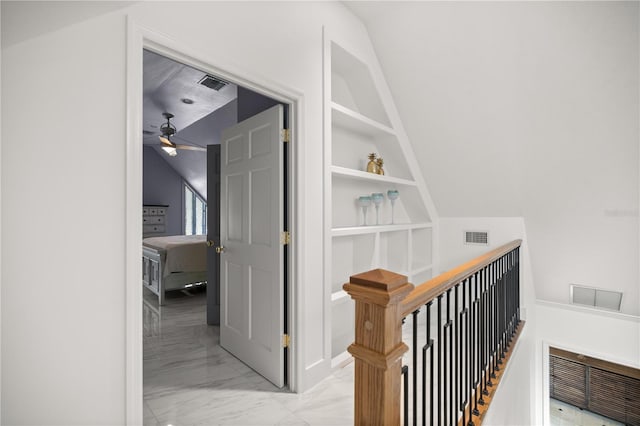 2130 SW 37th Street Rd, Ocala, FL 34471 - corridor with visible vents, marble finish floor, and built in shelves