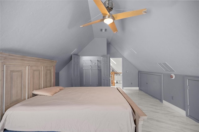 2130 SW 37th Street Rd, Ocala, FL 34471 - bedroom featuring visible vents, marble finish floor, and vaulted ceiling