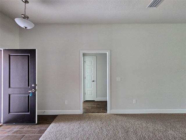 5045 N Triple Eagle Path, Beverly Hills, FL 34465 - empty room with baseboards and dark colored carpet
