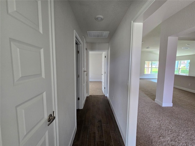 5045 N Triple Eagle Path, Beverly Hills, FL 34465 - corridor featuring baseboards and dark colored carpet